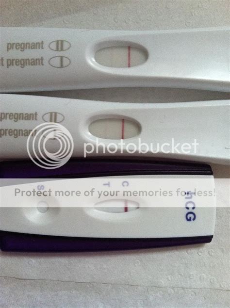 A magnifying glass. . Spotting 5 days before period bfp